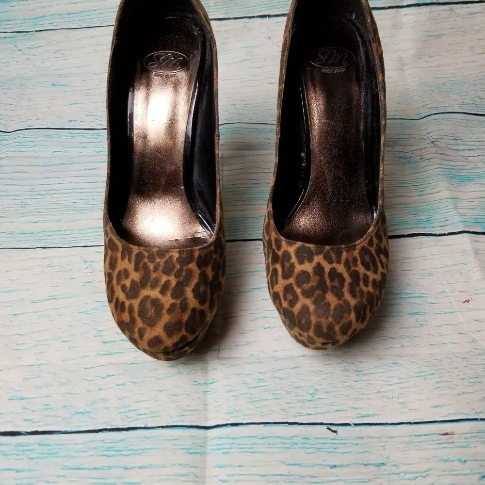 SM New York animal print platform shoes si…